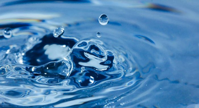 Water droplets, Blue water drops splashes. Drop water close-up, Blue water drop macro