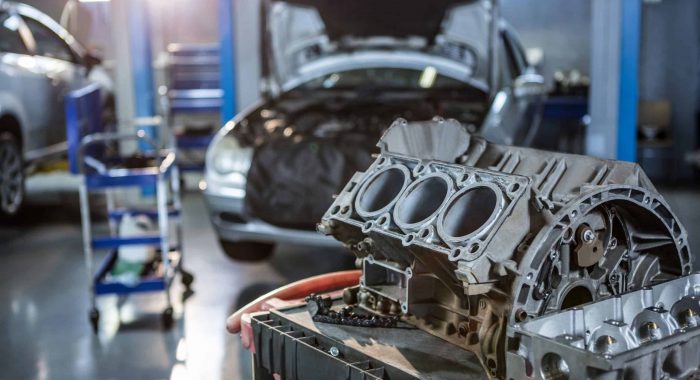 Close-up of car parts in repair garage
