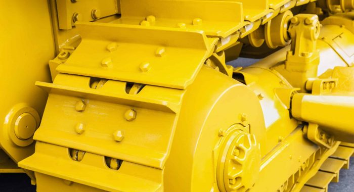 tracks of a tractor or bulldozer. Construction equipment