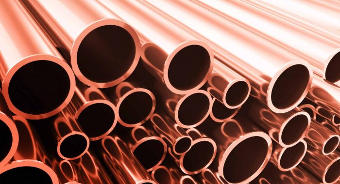 Industry business production and heavy metallurgical industrial products, many shiny steel pipes, industrial background, manufacturing business production concept, copper pipes with selective focus effect, 3D illustration