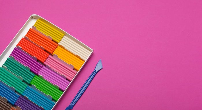 Colored plasticine for molding in box. Studio Photo