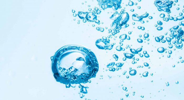 Bubbles in blue water background.